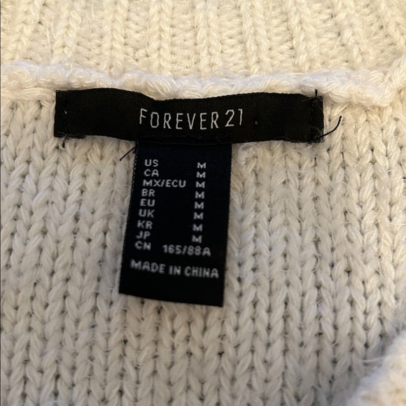 Sweater with shredded sleeves - Picture 4 of 8